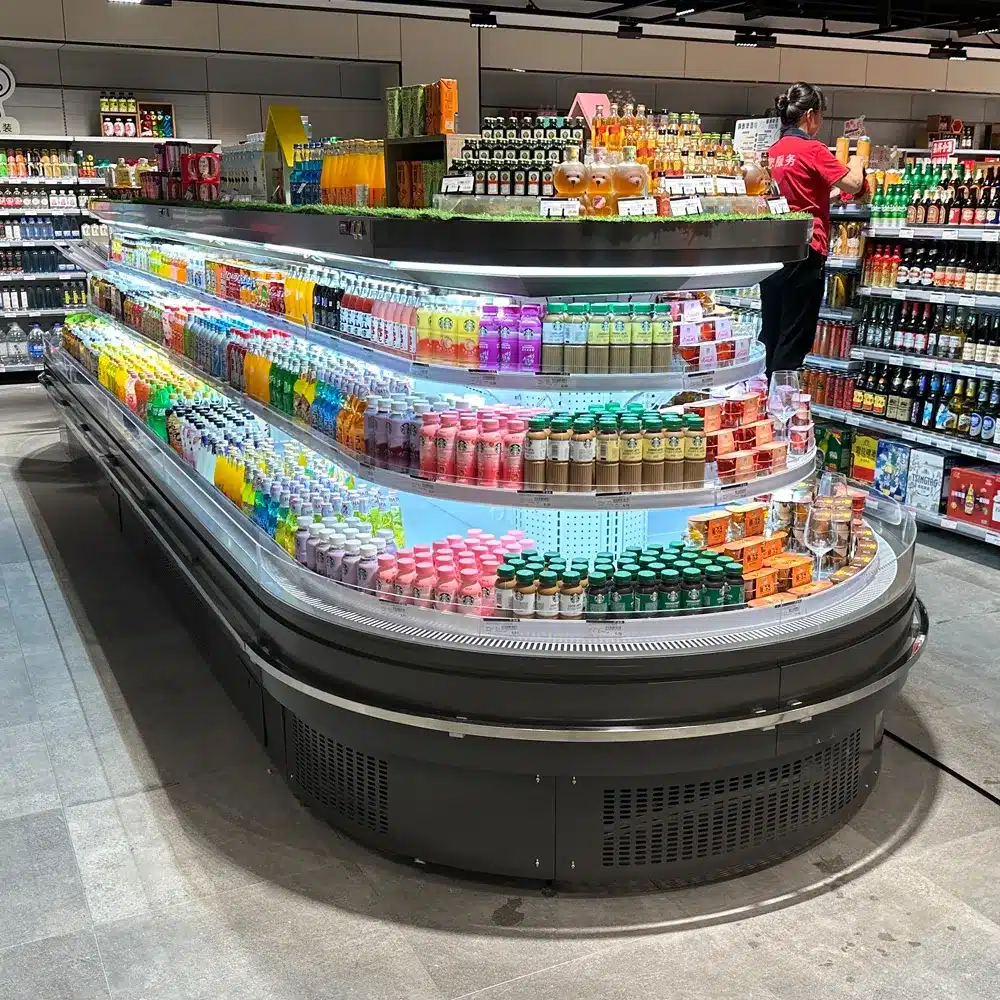 Grab-and-go semi-height plug-in refrigerated merchandiser with self-contained R290 cooling system, low-profile island architecture, and precision 0 to 5°C thermal control - XCCold Series