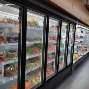 Minimalist Japanese-design remote swing door cooler with ultra-slim profile and precision 0 to 5°C industrial-grade cooling - XCCold Series