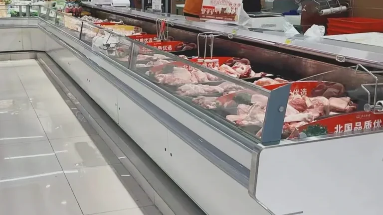 Remote Standard straight-glass butcher counter in a staffed meat department
